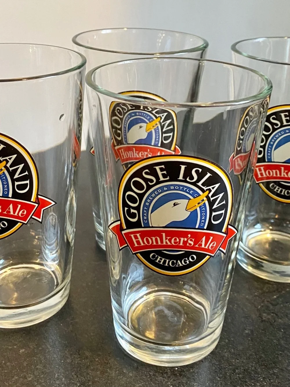 Four Beer Glasses from Goose Island, Chicago. Sturdy, Preowned, Minimal Use.